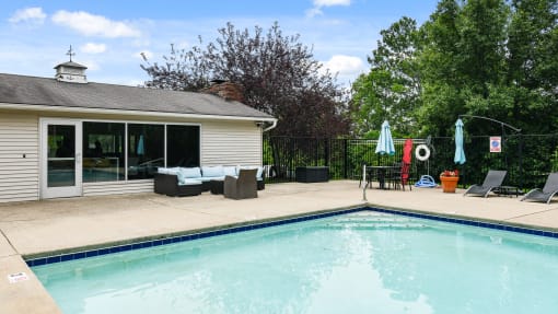Swimming Pool with Lounge Seats at Heritage Hill Estates Apartments, Cincinnati, Ohio 45227