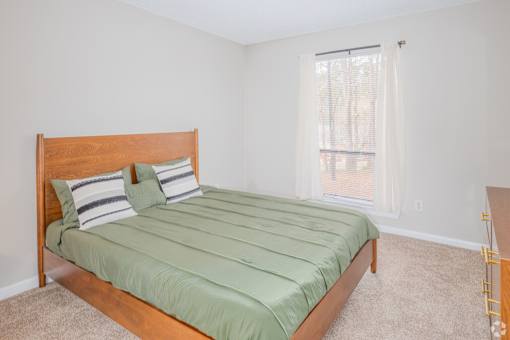 Primary Bedroom at Peachtree Place Apartments, Columbia