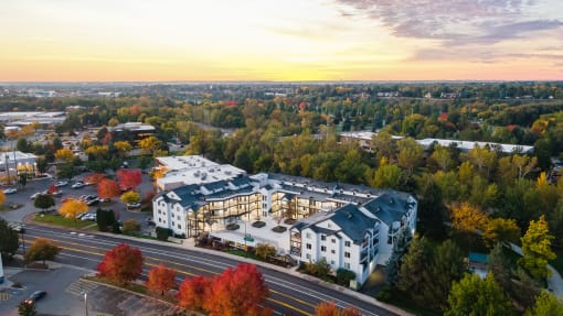an aerial view of an apartment building in the city at River Walk Apartments, Boise, 83702