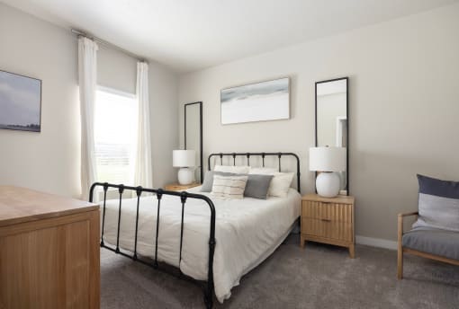 a bedroom with a bed in a room at The Alloy at Geneva, Vineyard, UT, 84058