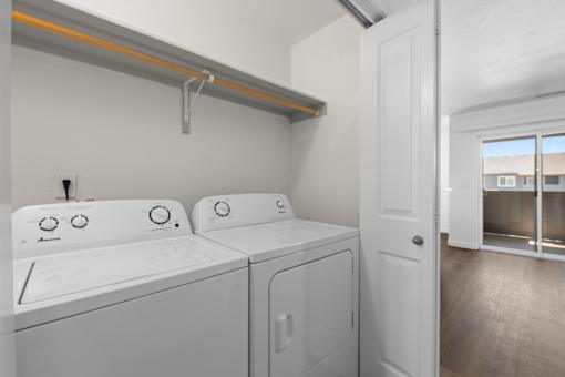 A laundry room with a washer and dryer.