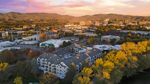 an aerial view of the city at sunset at River Walk Apartments, Idaho