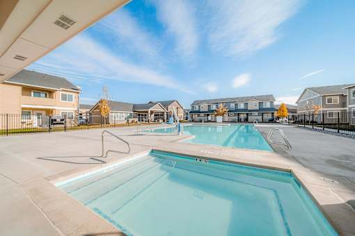 the preserve at ballantyne commons pool and apartment buildings