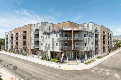 A large apartment complex with a sign that says "Terrace".