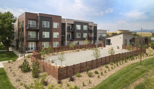 an aerial view of an apartment complex with a large patio and landscaping at Cycle Apartments, Fort Collins
