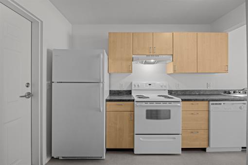 kitchen with a refrigerator at Great Northern, Missoula, MT