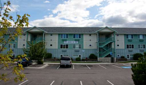building with a parking lot at Great Northern, Montana