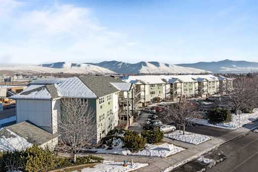 snowy landscape with mountains in the background at Great Northern, Montana, 59808