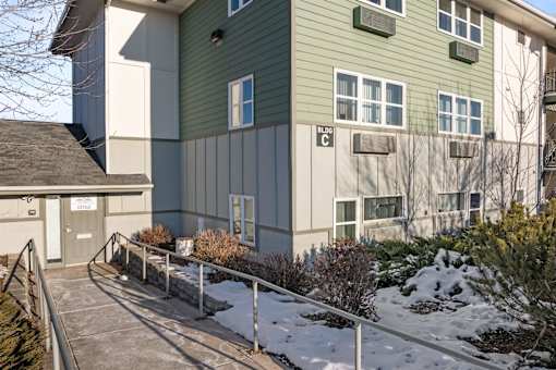 Exterior view of building with snow on ground at Great Northern, Missoula, MT