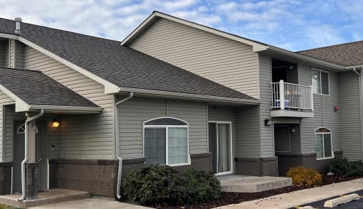 a gray house with a gray roof