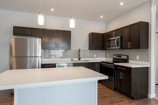 Kitchen with cabinets at The Expo Apartments, Billings