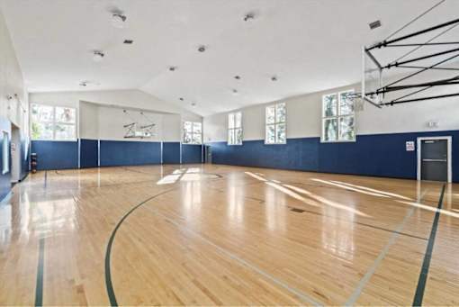 Indoor basketball court with professional flooring at Edgewater Apartments, Boise, Idaho