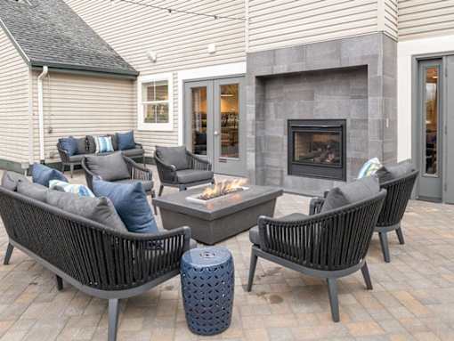 Outdoor fire pit patio with modern seating at Edgewater Apartments, Idaho, 83703