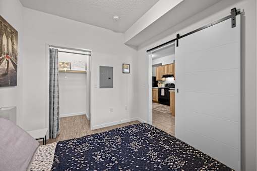A bedroom with a sliding door at Majestic Drive, Missoula Montana