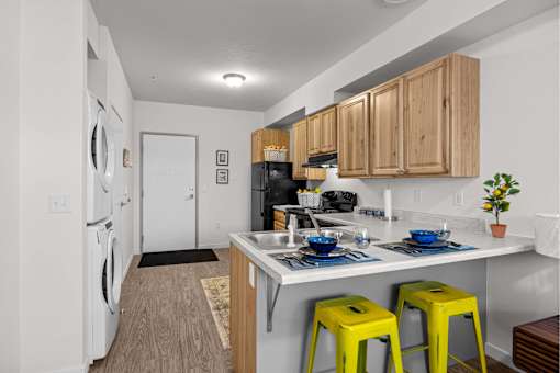 A kitchen with a washer and dryer built in at Majestic Drive, Montana, 59808