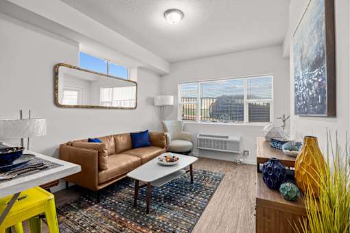 A living room with a brown couch at Majestic Drive, Missoula Montana