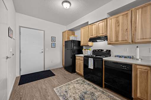 A kitchen with black appliances at Majestic Drive, Missoula, MT 59808