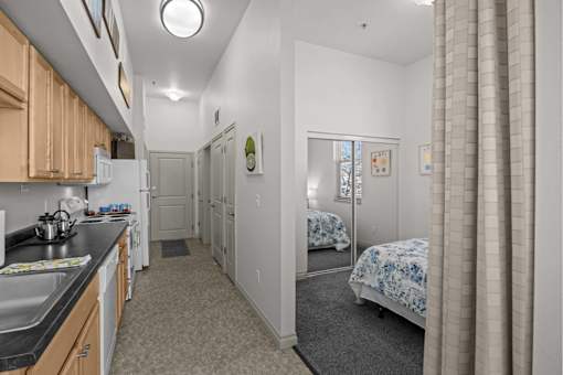 A kitchen with a sink and bed at Spruce Street, Missoula Montana