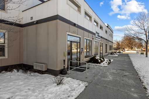 A building with a snow-covered ground at Spruce Street, Montana, 59802