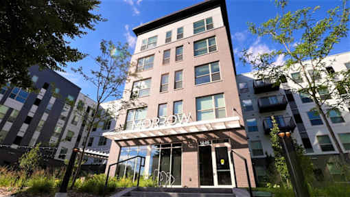 Exterior of Morrow Apartments in St. Paul, MN, featuring modern 1-3 bedroom rentals near the Green Line.