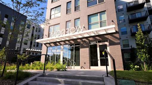 The entrance to a building with the name Morrow on it.