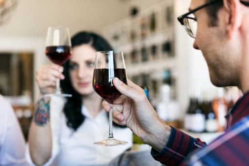 two people drinking red wine in a bar at Copestone, Garden City, Idaho 83714