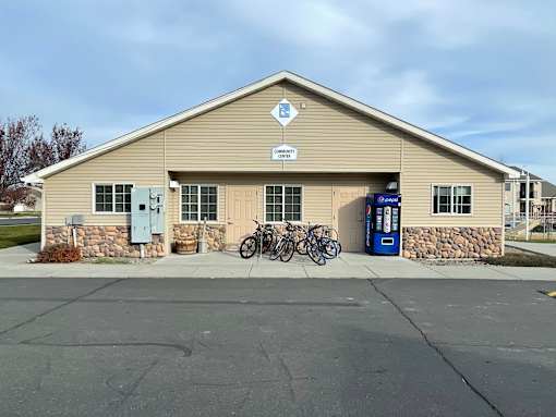 A building with a bicycle parked in front of it.