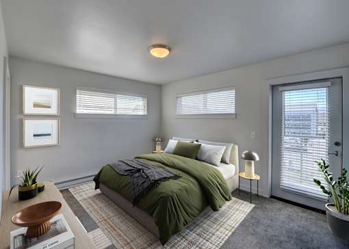 A bedroom with a bed, nightstand, and window at Four Points, Montana