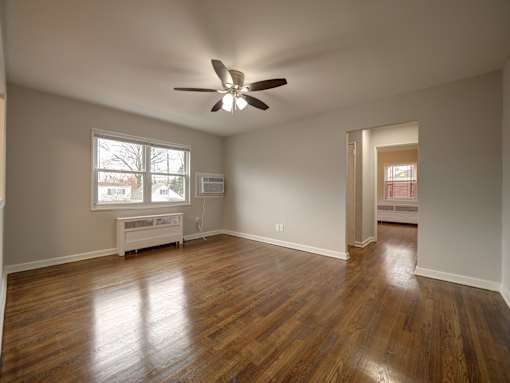 Vacant room with wooden floor at Garwood Gardens Apartments, New Jersey