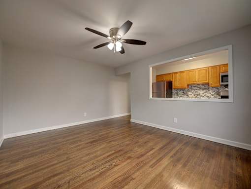 Living room with ceiling fan at Garwood Gardens Apartments, Garwood, NJ, 07027