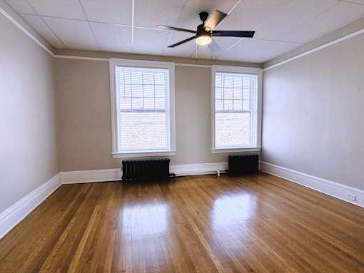 Room with ceiling fan at Willett Apartments, Albany, NY