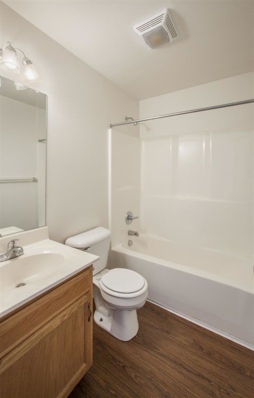 a bathroom with a toilet and a sink
