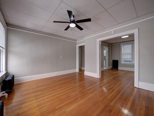 Unfurnished room brown wooden floor at Willett Apartments, Albany, New York