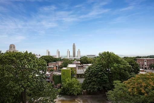 Aerial view of a city with mountains at Willett Apartments, Albany, NY, 12210