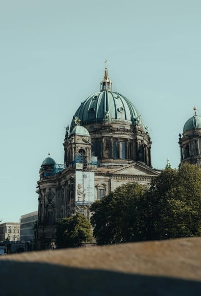 a large cathedral with a blue sky in the background
