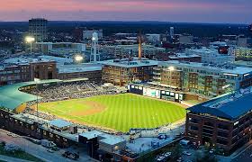 an aerial view of a baseball field in a city