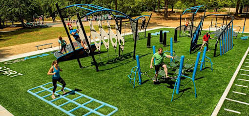 a group of people playing on a playground