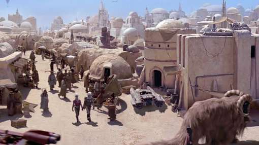A desert town with people and animals.