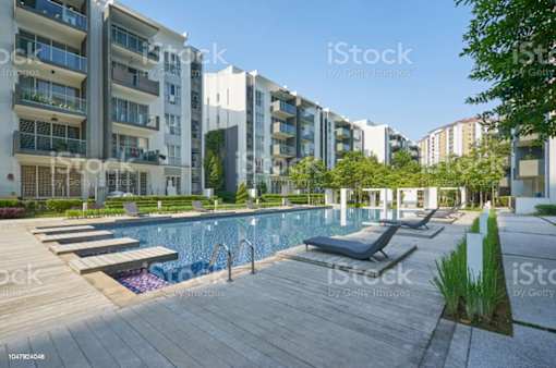 modern apartment buildings with a swimming pool royalty free apartment building stock photo download image now