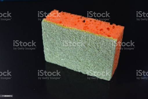 a sponge for washing dishes on a black background royalty free abstract stock illustration