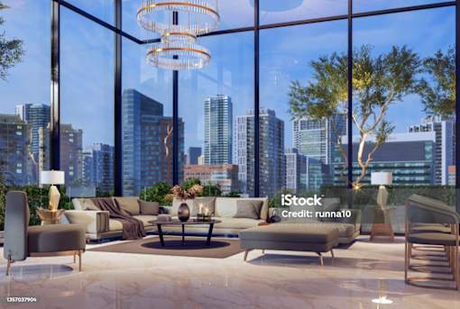 A modern living room with a view of the city skyline.