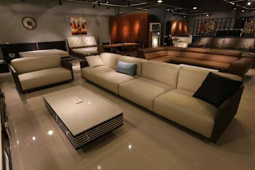 a living room with couches and a coffee table