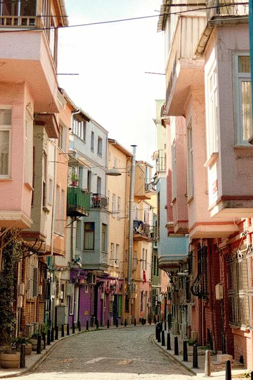 a narrow street with colorful buildings and