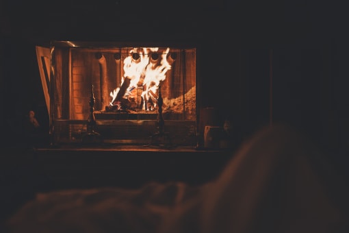 warming up by the fire