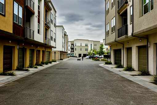 A long street with buildings on both sides.