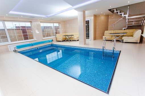 a house with a swimming pool in the living room
