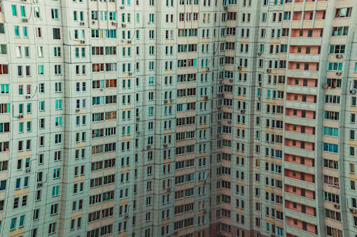 A tall building with many windows.