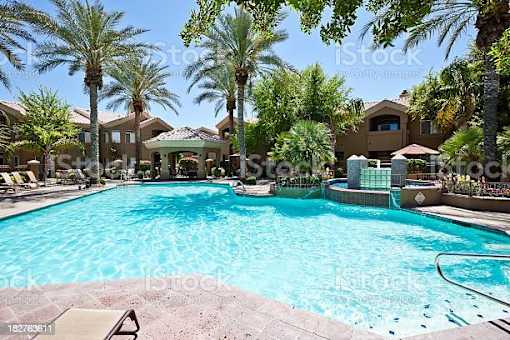 Pool outside of Apartment building