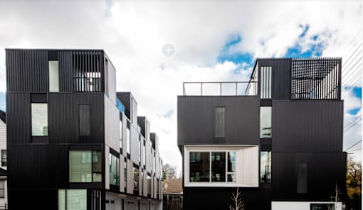 a row of houses stacked on top of each other