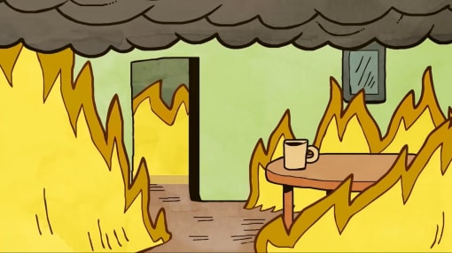 a cup of coffee is sitting on a table in the middle of a fire